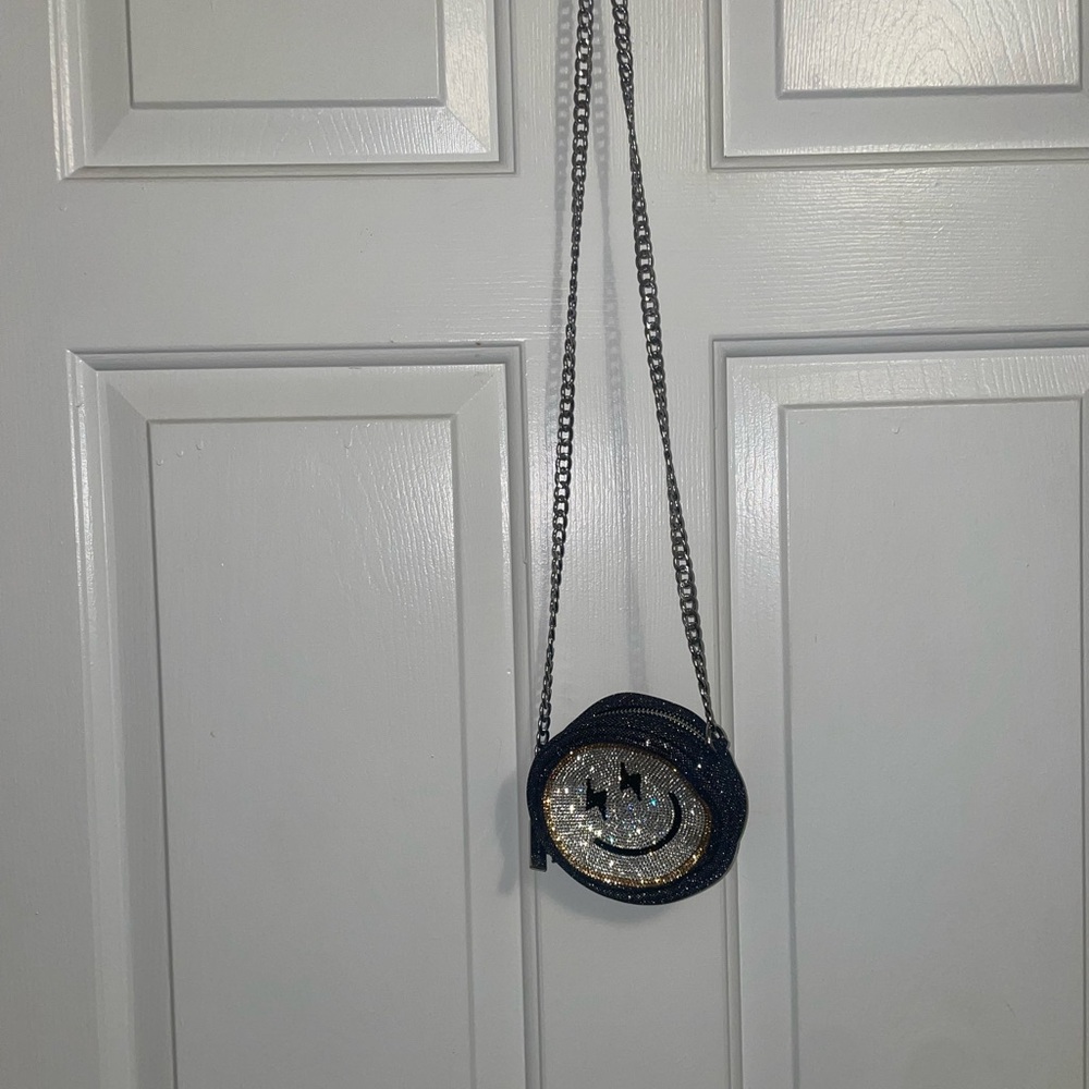 Skinnydip London smiley face crossbody bag